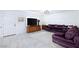 Bright living room featuring stylish floors, a TV, and a comfortable seating area at 3380 Kensbrook St, Las Vegas, NV 89121