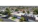 A charming street view highlights solar panels and well-manicured lawns in this inviting neighborhood at 3380 Kensbrook St, Las Vegas, NV 89121