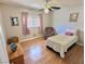 Comfortable bedroom with natural light and hardwood floors at 3585 Winner Dr, Las Vegas, NV 89120