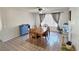Bright dining room featuring neutral walls, ceiling fan, and a wooden dining table set at 3585 Winner Dr, Las Vegas, NV 89120