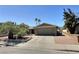 Charming single-story home with a well-maintained front yard and attached two-car garage at 3585 Winner Dr, Las Vegas, NV 89120