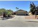 Charming single-story home with a well-maintained front yard and attached two-car garage at 3585 Winner Dr, Las Vegas, NV 89120