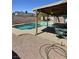 An inviting covered patio and refreshing swimming pool are perfect for relaxing and entertaining outdoors at 3585 Winner Dr, Las Vegas, NV 89120