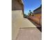This home features a spacious side yard with a concrete walkway and privacy fencing at 3585 Winner Dr, Las Vegas, NV 89120