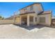 Backyard view featuring a covered patio and a balcony at 3828 Prairie Orchid Ave, North Las Vegas, NV 89081