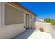 This balcony features a light colored patio, neutral paint, and views of the surrounding neighborhood at 3828 Prairie Orchid Ave, North Las Vegas, NV 89081