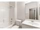 Bright bathroom with tub and shower combination, and single sink vanity at 3828 Prairie Orchid Ave, North Las Vegas, NV 89081