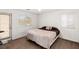 Bedroom with carpeted floors, bed, and lots of natural light at 3828 Prairie Orchid Ave, North Las Vegas, NV 89081