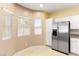 Eat-in kitchen with stainless steel appliances and a bay window that streams natural light at 3828 Prairie Orchid Ave, North Las Vegas, NV 89081