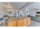 Open concept kitchen featuring a granite island and a casual dining area at 4421 Galapagos Ave, North Las Vegas, NV 89084