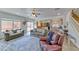 Bright and airy open floor plan showcasing living room and kitchen area at 4421 Galapagos Ave, North Las Vegas, NV 89084