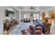 Spacious living room with comfortable seating, TV, and modern decor at 4421 Galapagos Ave, North Las Vegas, NV 89084