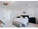 Serene main bedroom with neutral tones, decorative lighting, and sophisticated decor at 50 Grey Feather Dr, Las Vegas, NV 89135