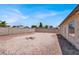 Expansive backyard with desert landscaping, offering privacy and potential for customization at 5030 E Hacienda Ave, Las Vegas, NV 89122