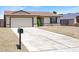 Charming single-story home featuring a two-car garage and low-maintenance landscaping at 5030 E Hacienda Ave, Las Vegas, NV 89122