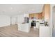 Bright kitchen with stainless steel appliances, an island, and modern cabinetry at 5030 E Hacienda Ave, Las Vegas, NV 89122