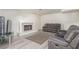 Cozy basement with a fireplace and comfortable seating area at 5228 Painted Lakes Way, Las Vegas, NV 89149