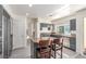 Beautiful kitchen with granite countertops, stainless steel appliances, and an island with bar seating at 5228 Painted Lakes Way, Las Vegas, NV 89149