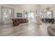 Spacious living room with modern flooring and abundant natural light at 5228 Painted Lakes Way, Las Vegas, NV 89149