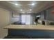 Bright kitchen featuring stylish counters, modern appliances, and plenty of cabinet space at 5404 Walcott Dr, Las Vegas, NV 89118