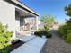 Charming front porch featuring comfortable seating, manicured landscaping, and a welcoming entrance at 6292 Yucca Valley Ct, Las Vegas, NV 89142