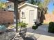 Outdoor storage shed with a small patio area and secure fencing at 6292 Yucca Valley Ct, Las Vegas, NV 89142