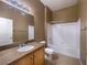 Neutral bathroom featuring a single sink vanity and a shower-tub combination at 700 Carnegie St # 4113, Henderson, NV 89052