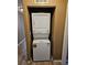 Efficient laundry closet with stacked washer and dryer units at 700 Carnegie St # 4113, Henderson, NV 89052