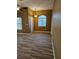 Bright living room featuring wood-look flooring and a window for natural light at 700 Carnegie St # 4113, Henderson, NV 89052