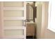 Stylish bathroom featuring barn door and modern vanity at 7253 Alsop Ct, Las Vegas, NV 89156