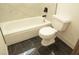 Bathroom featuring a combination of tub and toilet, perfect for a new home buyer at 7253 Alsop Ct, Las Vegas, NV 89156