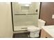 Modern bathroom with glass enclosed shower, stylish tiles, and contemporary fixtures at 7253 Alsop Ct, Las Vegas, NV 89156