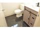 Modern bathroom featuring a rustic vanity with a black marble floor at 7253 Alsop Ct, Las Vegas, NV 89156