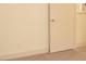 This bedroom features neutral carpet, cream colored walls, and a door at 7253 Alsop Ct, Las Vegas, NV 89156