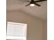 Bright bedroom with ceiling fan and natural light from the window at 7253 Alsop Ct, Las Vegas, NV 89156