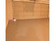 This garage is spacious and features a roll-up door and sealed concrete floors at 7253 Alsop Ct, Las Vegas, NV 89156