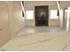 Spacious living room with modern fireplace and access to a patio at 7253 Alsop Ct, Las Vegas, NV 89156