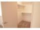 The walk-in closet has built-in shelves and carpeted floor, providing ample storage space at 7253 Alsop Ct, Las Vegas, NV 89156