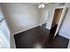 The modern bedroom features hardwood floors, a closet, and a window with natural light at 8455 W Sahara Ave # 213, Las Vegas, NV 89117