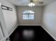 This bedroom boasts hardwood floors, a ceiling fan, and a bright window at 8455 W Sahara Ave # 213, Las Vegas, NV 89117