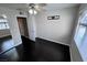 View of the bedroom shows hardwood floors, ceiling fan, and an adjacent closet at 8455 W Sahara Ave # 213, Las Vegas, NV 89117