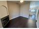 The living room features hardwood floors and fireplace at 8455 W Sahara Ave # 213, Las Vegas, NV 89117