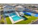 Aerial view showcasing a large pool, spa, putting green, and sports court in a luxury backyard at 8528 Baltimore Heights Ct, Las Vegas, NV 89113