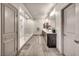 Modern bathroom boasts a frameless glass shower and double vanity sinks at 8528 Baltimore Heights Ct, Las Vegas, NV 89113