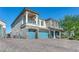 Stunning two-story home boasts an attached three-car garage at 8528 Baltimore Heights Ct, Las Vegas, NV 89113