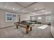 Spacious game room with pool table, recessed lighting and comfortable seating at 8528 Baltimore Heights Ct, Las Vegas, NV 89113