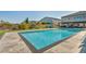 Enjoy a sparkling pool with integrated spa and large patio and lounge area at 8528 Baltimore Heights Ct, Las Vegas, NV 89113
