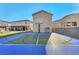 The private sports court creates a versatile recreation area for the whole Gathering at 8528 Baltimore Heights Ct, Las Vegas, NV 89113