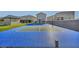 Outdoor sports court provides recreational fun for all ages, surrounded by lush greenery, perfect for an active lifestyle at 8528 Baltimore Heights Ct, Las Vegas, NV 89113