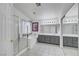 Bathroom featuring large shower, vanity with double sinks and tile floors at 8529 Gold Flash Ave, Las Vegas, NV 89129